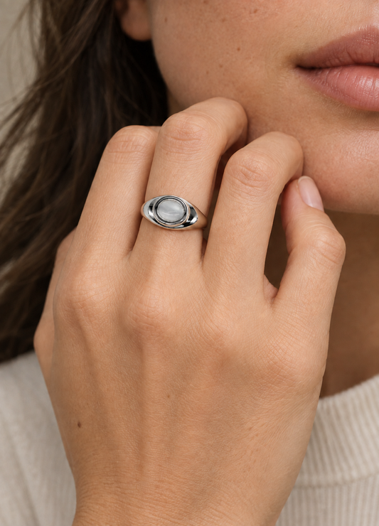 spiral silver ring on hand