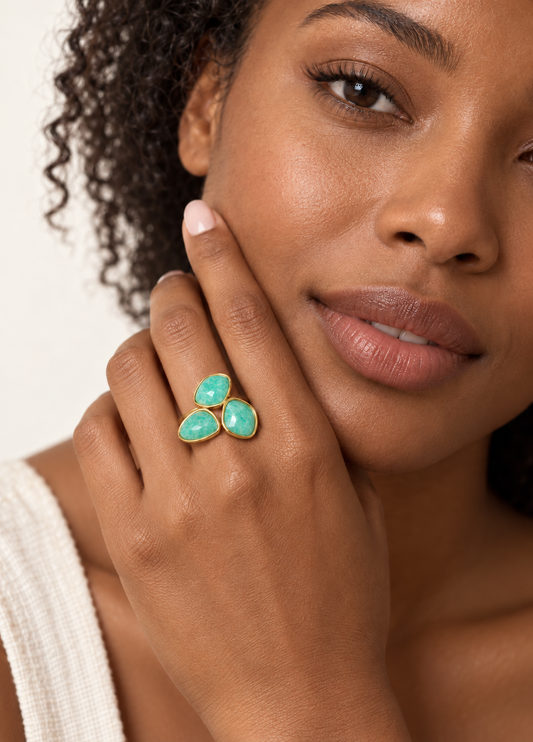 turquoise stone trio ring on hand