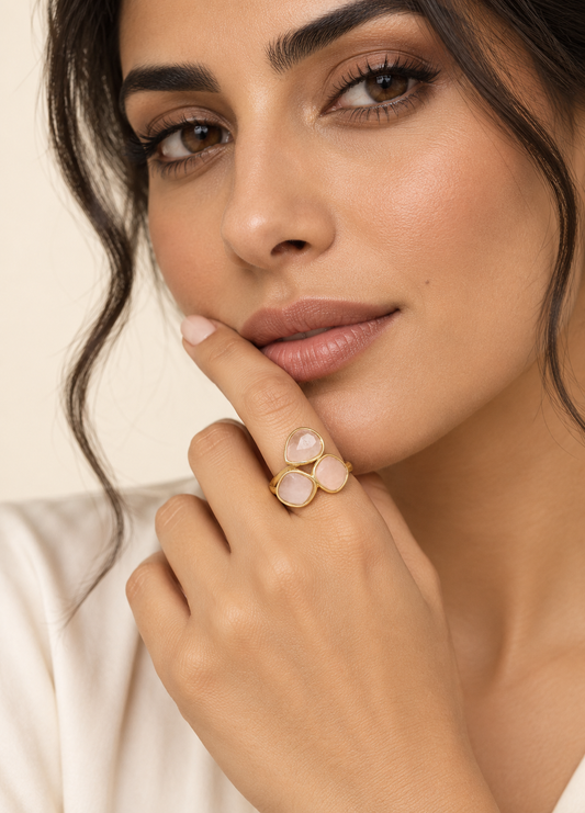 blush pink crystal trio ring on hand
