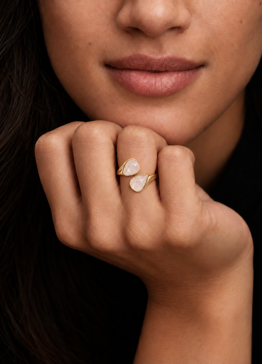 ivory teardrop bypass ring on hand