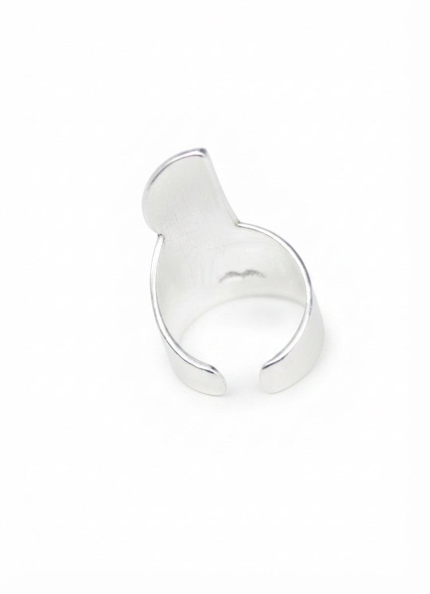silver hammered abstract face statement ring back view
